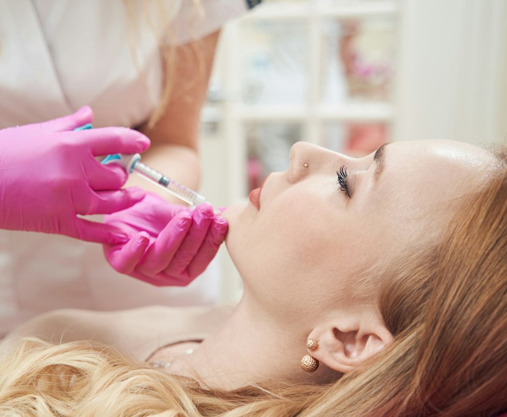 Needle, woman, beauty, skincare process and aesthetic filler in stud