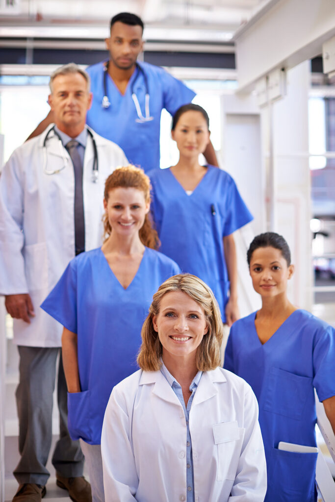 Modern aesthetic training facility with injection stations and live model practice areas for nurse education