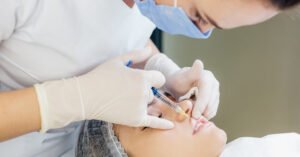 ODQ authorized Botox training for dentists in Montreal showing professional injection technique demonstration by AMEQ Academy instructor